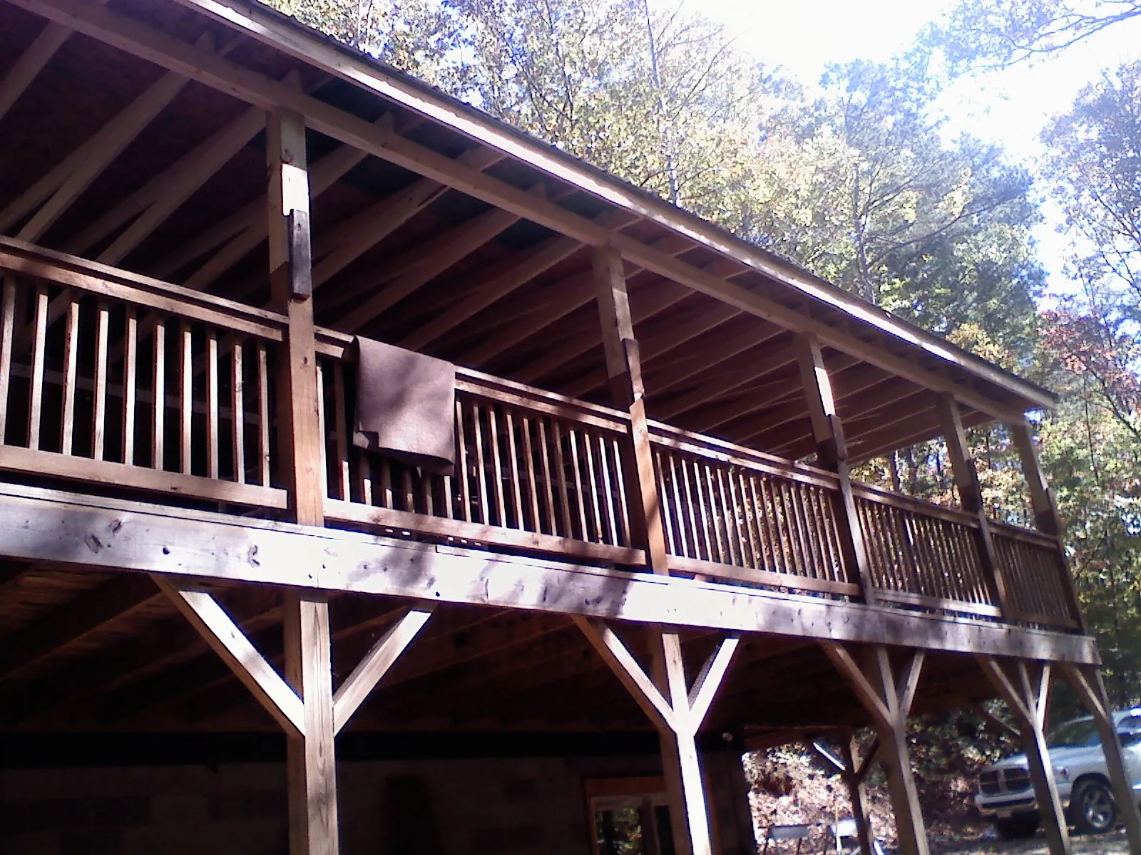 Timber framing under a new elevated porch and deck — Roof Leak Repair in Cedar Lake by Roofing Brothers